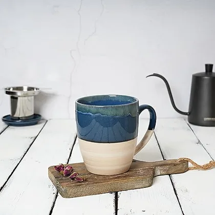 A Bosmarlin mug in a reactive glaze