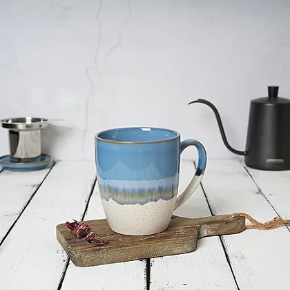 A Bosmarlin mug in a reactive glaze