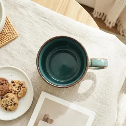 A Bosmarlin mug in a reactive glaze