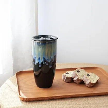 A Bosmarlin mug in a reactive glaze