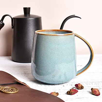 A Bosmarlin mug in a reactive glaze