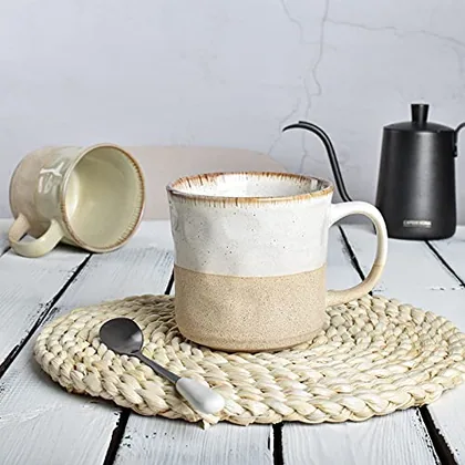 A Bosmarlin mug in a reactive glaze