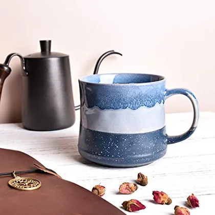 A Bosmarlin mug in a reactive glaze