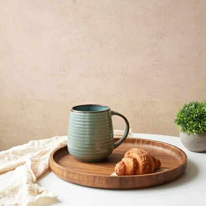 A Bosmarlin mug in a reactive glaze
