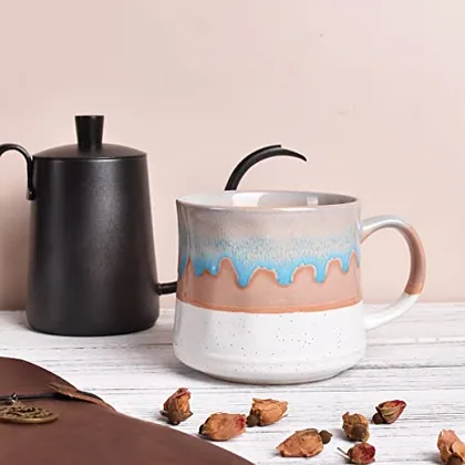 A Bosmarlin mug in a reactive glaze