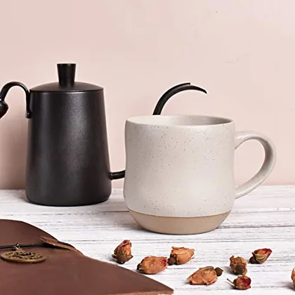 A Bosmarlin mug in a reactive glaze