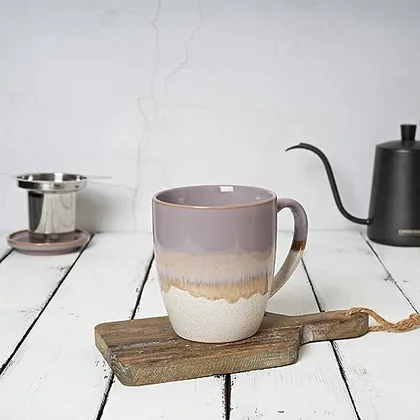 A Bosmarlin mug in a reactive glaze
