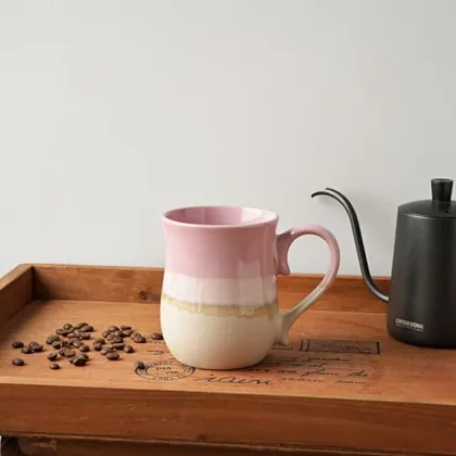 A Bosmarlin mug in a reactive glaze