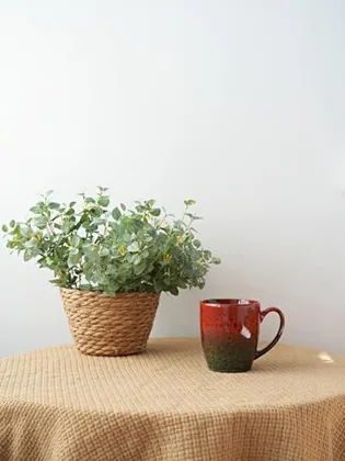 A Bosmarlin mug in a reactive glaze
