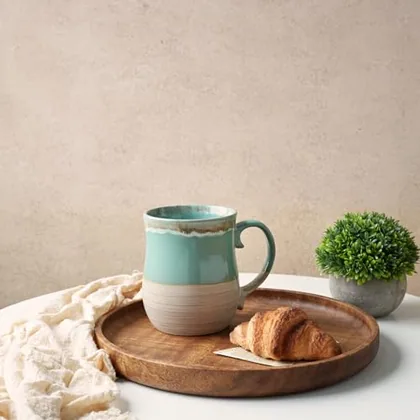 A Bosmarlin mug in a reactive glaze