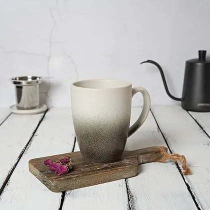 A Bosmarlin mug in a reactive glaze
