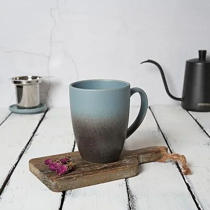A Bosmarlin mug in a reactive glaze