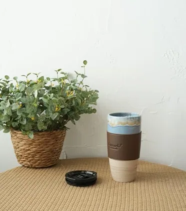 A Bosmarlin mug in a reactive glaze