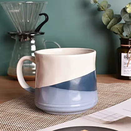 A Bosmarlin mug in a reactive glaze