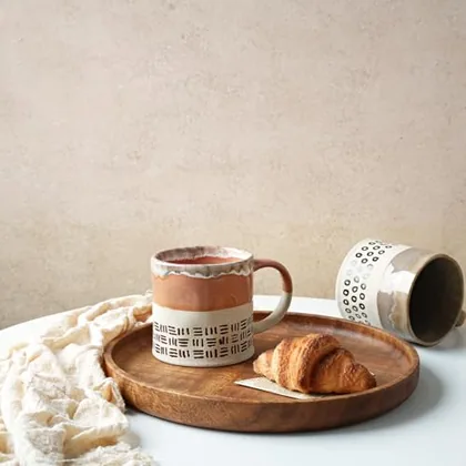 A Bosmarlin mug in a reactive glaze