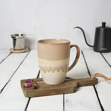 A Bosmarlin mug in a reactive glaze