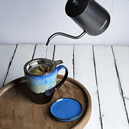 A Bosmarlin mug in a reactive glaze