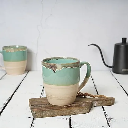 A Bosmarlin mug in a reactive glaze