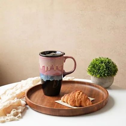 A Bosmarlin mug in a reactive glaze