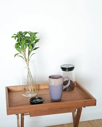 A Bosmarlin mug in a reactive glaze