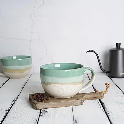 A Bosmarlin mug in a reactive glaze