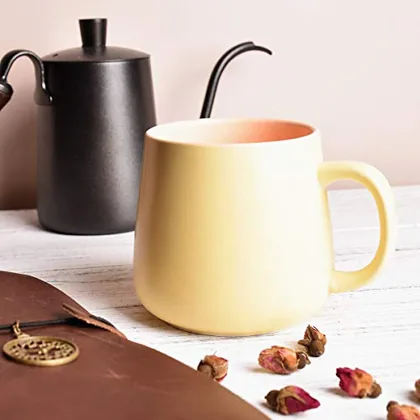 A Bosmarlin mug in a reactive glaze