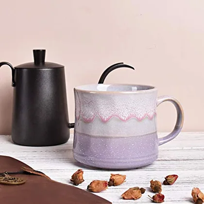 A Bosmarlin mug in a reactive glaze