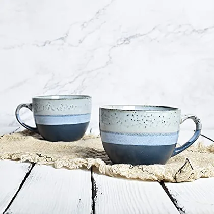 A Bosmarlin mug in a reactive glaze