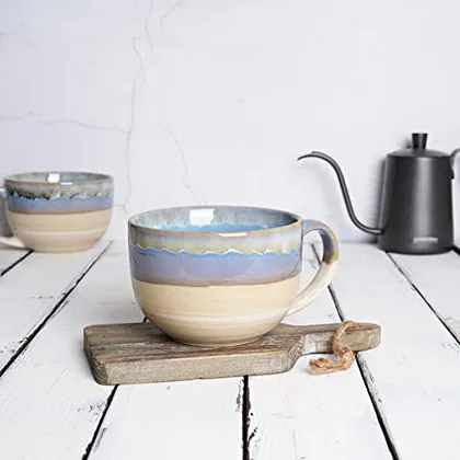 A Bosmarlin mug in a reactive glaze